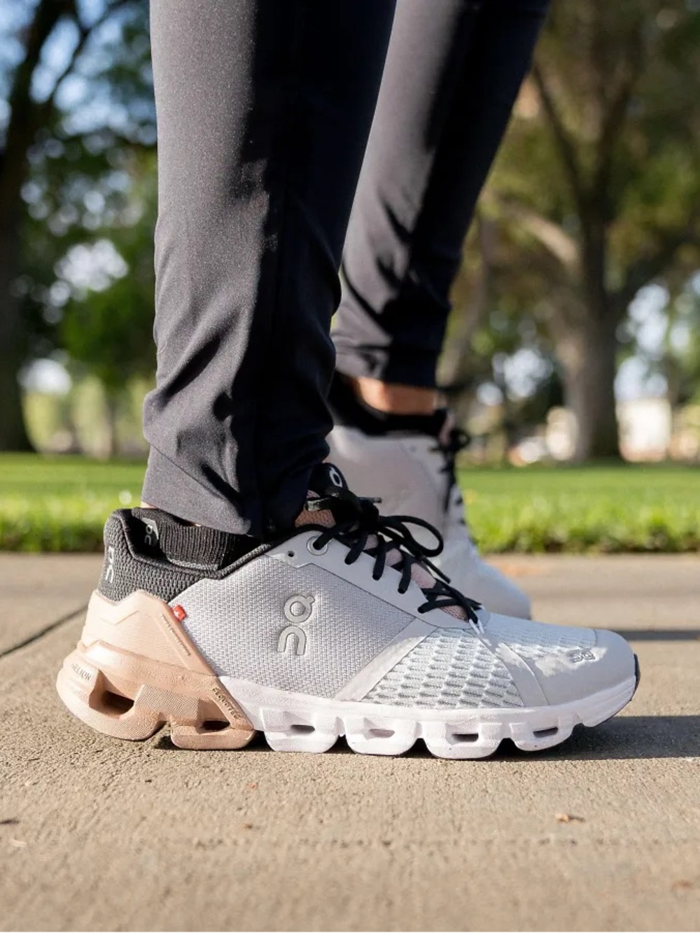On Running Women’s Cloud Sneaker in White with Blush Accents